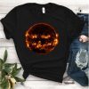 Sun 'smiles' like a Halloween pumpkin in NASA Shirt