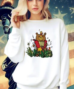 Making music a song bird and a bear with an accordion shirt