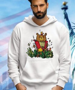 Making music a song bird and a bear with an accordion shirt